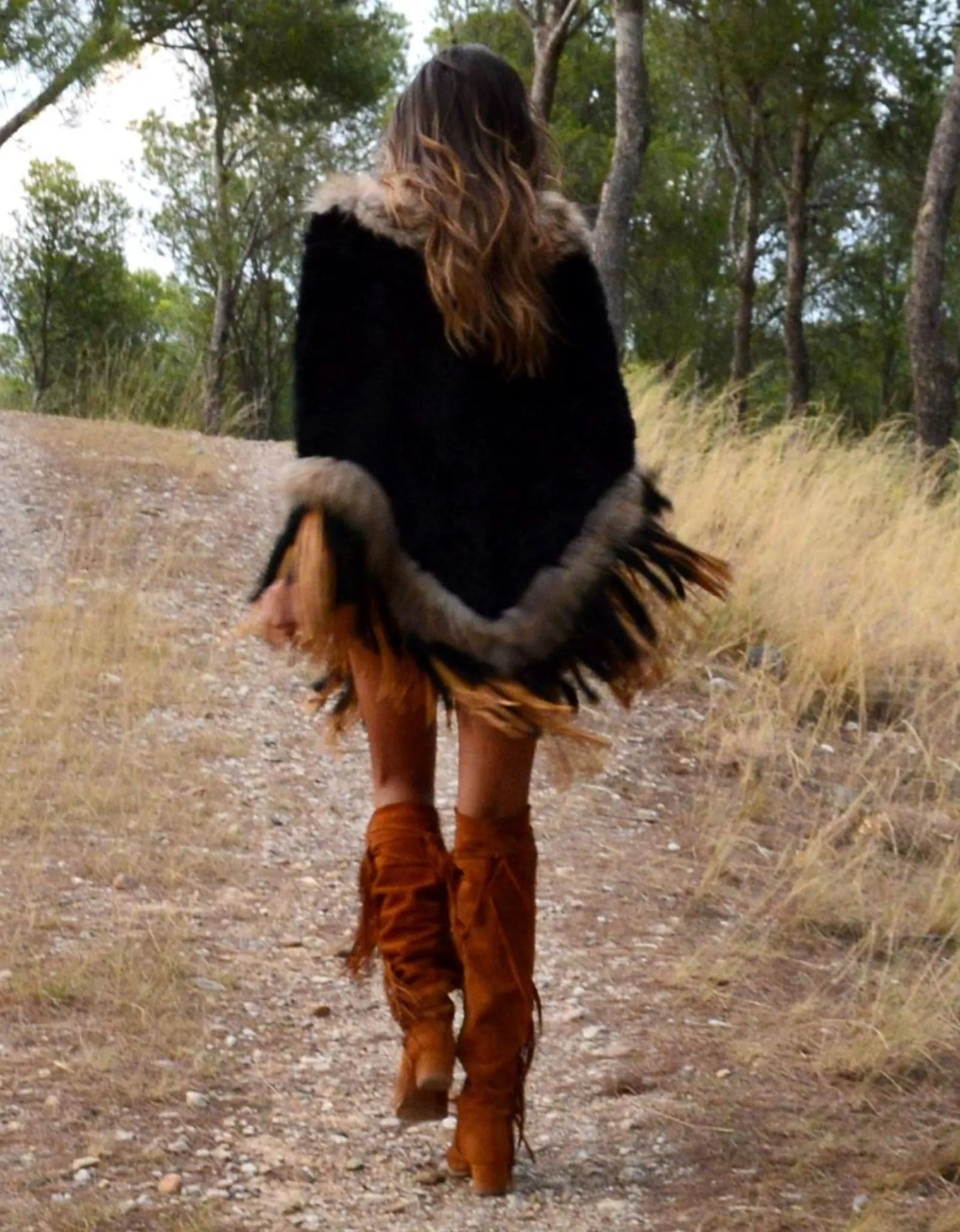 Fur Poncho with Tassels in Black